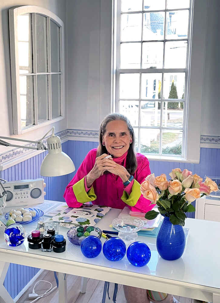 Alexandra at her writing desk.