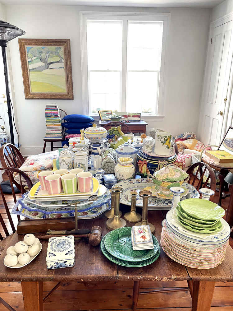 Alexandra's dining room table covered in items to give away