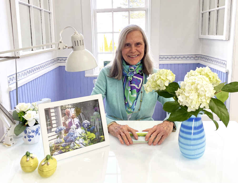 Alexandra at her kitchen writing desk