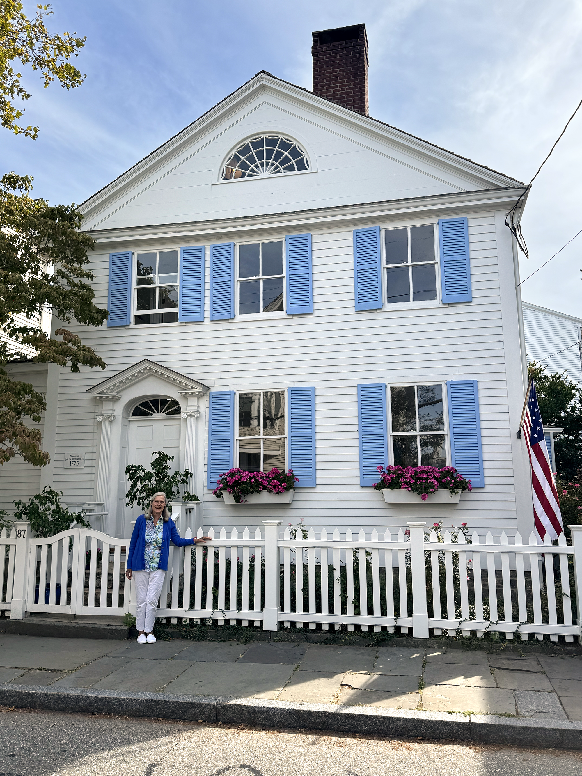 Alexandra in front of the cottage.